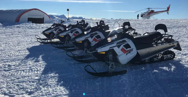 Snowmobiling Experience with Helicopter Flight — helicopter tour in Queenstown