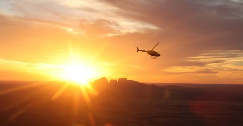 Yulara: Uluru and Kata Tjuta Sunset Helicopter Tour — helicopter tour in Uluru